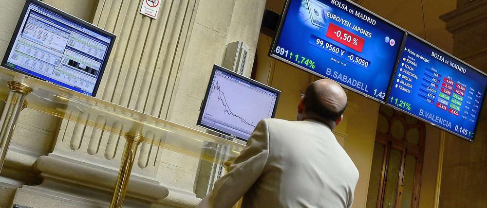 Die Börse in Madrid: Die Risikoaufschläge für zehnjährige spanische Staatsanleihen stiegen am Montag über die Marke von sieben Prozent und erreichten damit den höchsten Stand seit Einführung des Euro. 