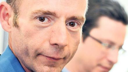 Symbol der Hoffnung. Der „Berliner Patient“ Timothy Brown bei einem HIV-Kongress im Mai 2012 in Marseille. Rechts von ihm sein ehemaliger Berliner Arzt Gero Hütter.