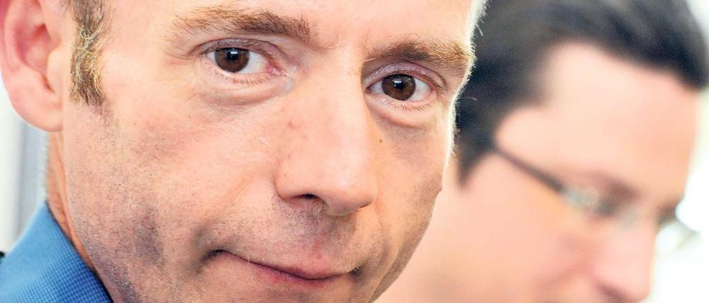 Symbol der Hoffnung. Der „Berliner Patient“ Timothy Brown bei einem HIV-Kongress im Mai 2012 in Marseille. Rechts von ihm sein ehemaliger Berliner Arzt Gero Hütter. 