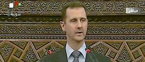 Baschar al-Assad spricht vor dem Parlament in Damaskus. Die Rede wurde vom Staatsfernsehen übertragen.