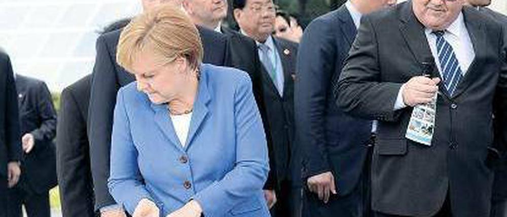 Anschlussproblem: Wenn die Regierung Anreize zum Ausbau eines E-Auto-Massenmarkts nicht umsetzt, droht Deutschland hinter seine Ziele zurückzufallen, sagen Kritiker.