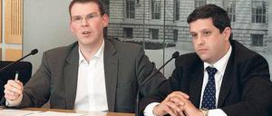 An einem Tisch. CDU-Fraktionschef Florian Graf (l.) und SPD-Kollege Raed Saleh sind mit Rot-Schwarz zufrieden. Foto: dpa/Schlesinger