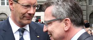 Christian Wulff (li.) mit Thomas de Maizière.