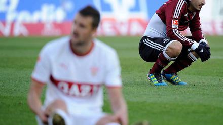 Keine Sieger - die Nürnberger um Almog Cohen ( r.) konnten trotz zweimaliger Führung gegen den VfB Stuttgart nicht gewinnen.