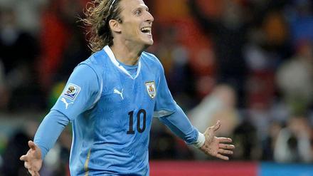 Er ist der Beste. Diego Forlan darf sich über den Goldenen Ball als Top-Spieler dieser WM freuen.