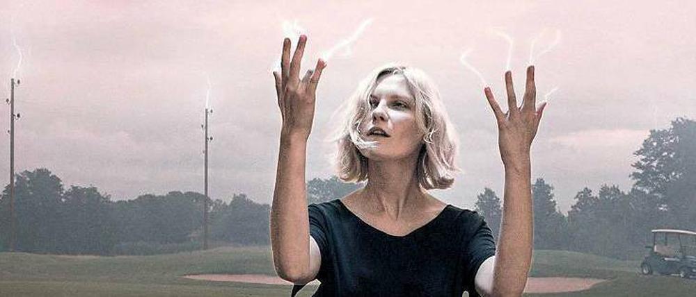 Komplizin des Todes. Kirsten Dunst als Justine, Hellsichtige und Blitzableiterin. Der Film läuft ab Donnerstag im Kino. 