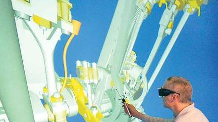 „Männer der Tat“. Deutsche Ingenieure (hier ein Wissenschaftler bei einer 3-D-Simulation) suchten im 19. Jahrhundert nach dem passenden Image für ihre noch junge Disziplin. 