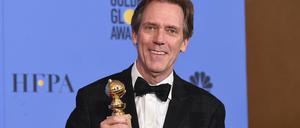 Hugh Laurie mit dem Golden Globe für die beste Nebenrolle in einer TV-Serie "The Night Manager" (2017).