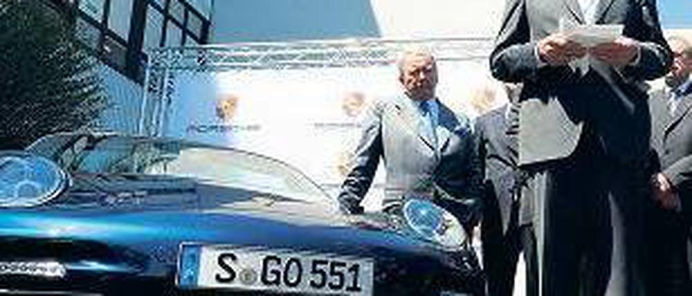 Antrittsbesuch. Der grüne Regierungschef Kretschmann gibt Porsche die Ehre.Foto: dpa