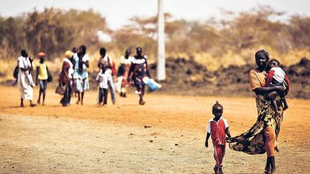 Auf der Flucht. Bauern aus der umstrittenen Grenzregion flüchten in Richtung Südsudan. Foto: AFP