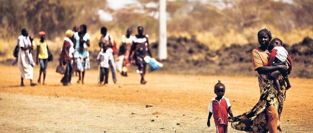 Auf der Flucht. Bauern aus der umstrittenen Grenzregion flüchten in Richtung Südsudan. Foto: AFP