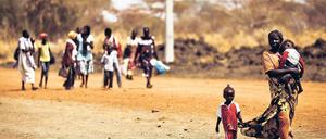 Auf der Flucht. Bauern aus der umstrittenen Grenzregion flüchten in Richtung Südsudan. Foto: AFP