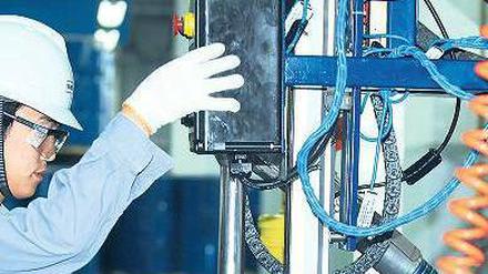 Vor Ort. Deutsche Firmen produzieren immer häufiger dort, wo ihre Absatzmärkte liegen, zum Beispiel Wacker Chemie in Zhangijagang (China).