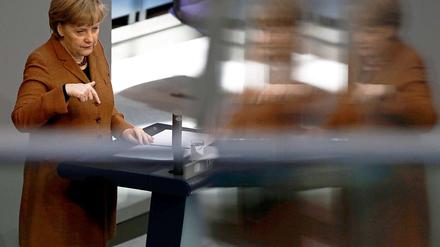 Energisch verteidigt Kanzlerin Merkel im Bundestag die Positionen der schwarz-gelben Koalition.