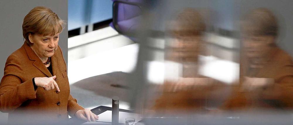 Energisch verteidigt Kanzlerin Merkel im Bundestag die Positionen der schwarz-gelben Koalition.
