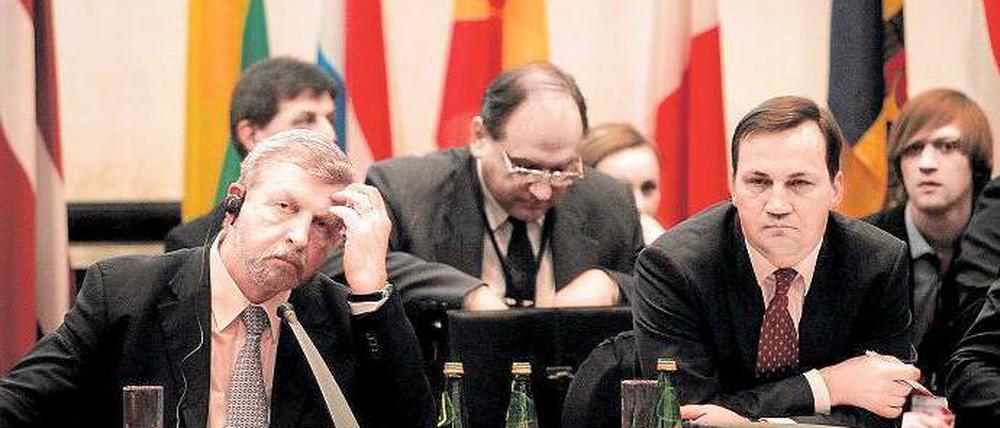 Der Oppositionelle Milinkewitsch (links) und Polens Außenminister Sikorski. Foto: rtr