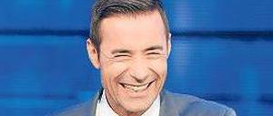 Zwillinge öffentlich-rechtlicher Show-Unterhaltung, das sind Kai Pflaume (links) und Jörg Pilawa. Beide moderieren in vergleichbarer Manier Ratespiele. Fotos: NDR/ZDF