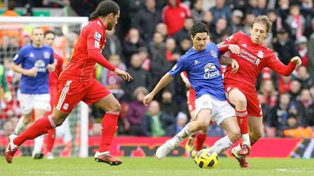 Geht ran - real und virtuell: Glen Johnson (links).