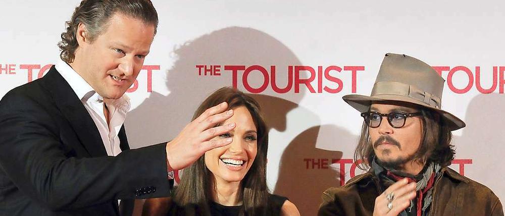 Bei der Deutschland-Premiere zu "The Tourist" waren sie noch gut gelaunt: Florian Henckel von Donnersmarck, Angelina Jolie und Johnny Depp (v. l.).
