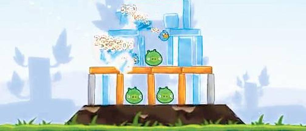Für Kindsköpfe. Die Verkaufsschlager unter den Casual Games: In „Angry Birds“ werden kleine Piepmätze auf fiese Schweinchen in Bretterverschlägen geschleudert.