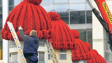 Eine Mütze hält die Hitze. Diese „Dämmstoffe“ sind garantiert umweltfreundlich. Foto: dpa