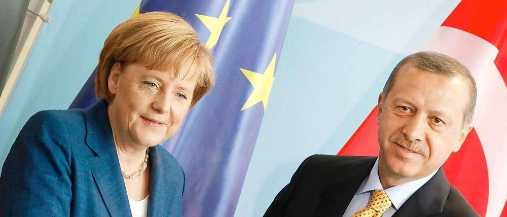 Das Fußballspiel war die Kür, jetzt folgt die Pflicht: Merkel und Erdogan besprechen Integration und den EU-Beitritt der Türkei.