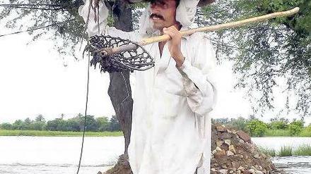 Naturkatastrophen, im Bild Pakistan, häufen sich. Die Versicherer reagieren.