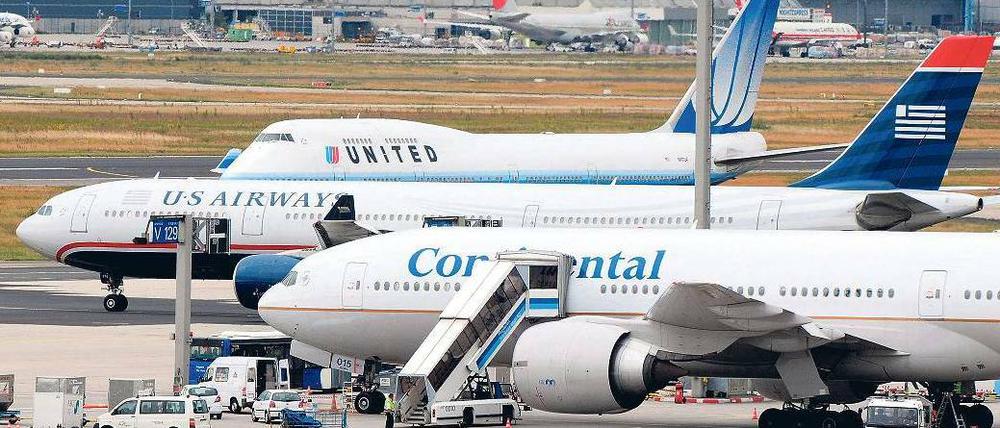 Gemeinsam auf dem Rollfeld. Künftig wollen Continental und United zusammen 144 Millionen Passagiere befördern.