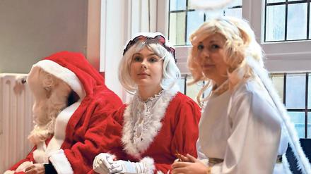 Unisex. Weihnachtsmänner, Weihnachtsfrauen und Engel.