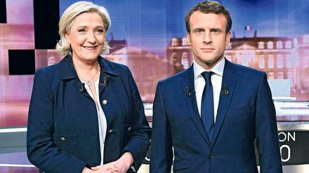 Zwei Kandidaten, ein Amt. Marine le Pen und Emmanuel Macron.
