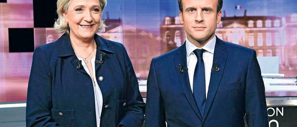 Zwei Kandidaten, ein Amt. Marine le Pen und Emmanuel Macron.