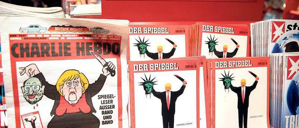 Schlachteplatte. Die aktuellen Cover von „Charlie Hebdo“ (links) und „Spiegel“.