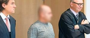 Nur Dienstleister? Muhammad H. (l.) mit einem seiner Anwälte.