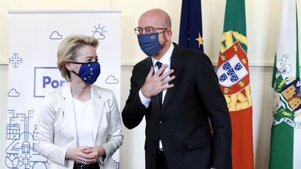 President of the European Council Charles Michel and President of the European Commission Ursula von der Leyen attend a ceremony to present the keys to the city of Porto at Porto City hall, Portugal, May 7, 2021. Estela Silva/Pool via REUTERS
