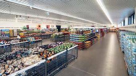 Mehr Platz. Breite Gänge und niedrige Regale sollen den Aldi-Kunden das Einkaufen erleichtern. Dafür sind größere Filialen nötig.