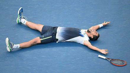 Geplättet. Marin Cilic gewinnt das Finale in New York gegen Kei Nishikori nicht nur für sich, sondern auch für seine ganze Nation.