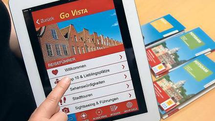 Buch und App. Der Vista-Verlag hat einen Potsdam-Führer herausgegeben.