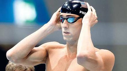 Auf seine Kappe. Michael Phelps will es noch mal wissen.