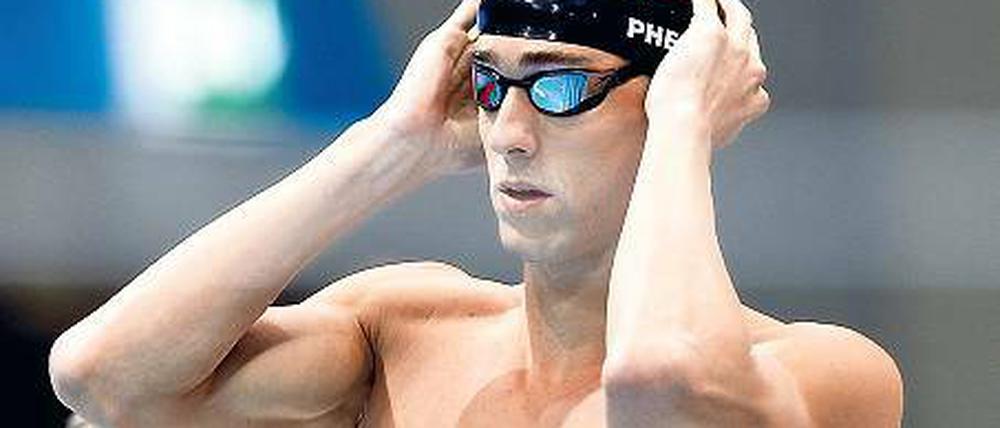 Auf seine Kappe. Michael Phelps will es noch mal wissen.