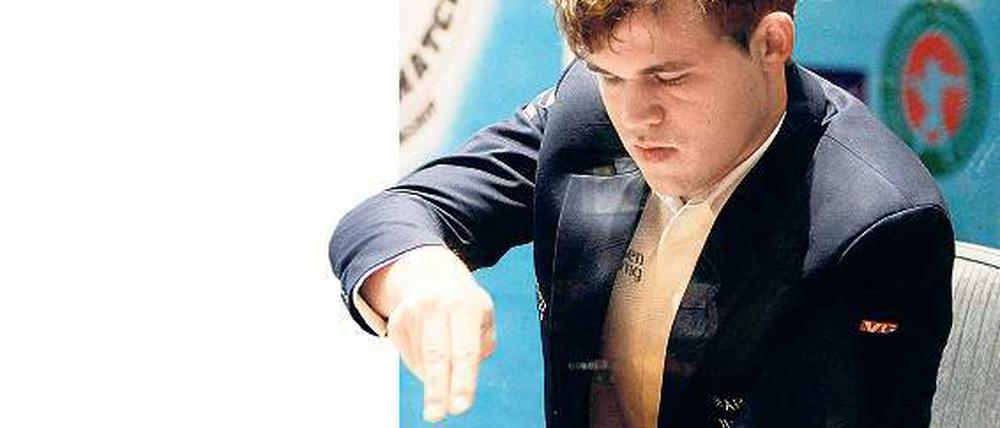 Zugspitze. M. Carlsen ist der 16. Schachweltmeister der Geschichte.