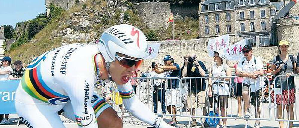 Schneller als der Überflieger. Bei seinem Sieg im Zeitfahren am Mittwoch hängte Tony Martin sogar den Gesamtführenden Christopher Froome ab.