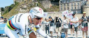 Schneller als der Überflieger. Bei seinem Sieg im Zeitfahren am Mittwoch hängte Tony Martin sogar den Gesamtführenden Christopher Froome ab.