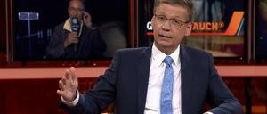 Potsdamer unter sich: Günther Jauch bittet Matthias Platzeck um einen Lagebericht von der Elbe.