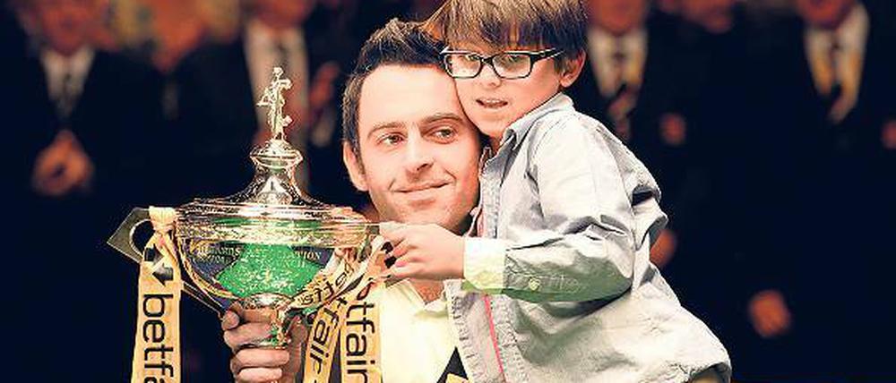 Titel für die Familie. Weltmeister Ronnie O’Sullivan mit Filius.