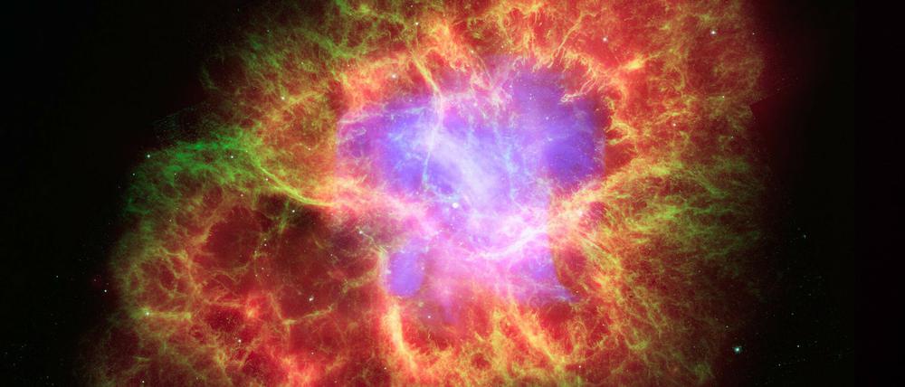 Unerklärliche Expansion. Anhand der Bewegungen von Supernovae – hier im Krebsnebel – können Astronomen auf die Ausdehnung des Universums schließen.
