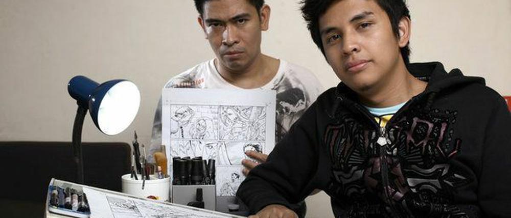 Die beiden Comic-Zeichner Eugene Perez Jr. und Johan Go auf den Philippinen ist die Wolfsgeschichte aus Deutschland eine völlig neue Aufgabe. In Brandenburg waren sie noch nie.