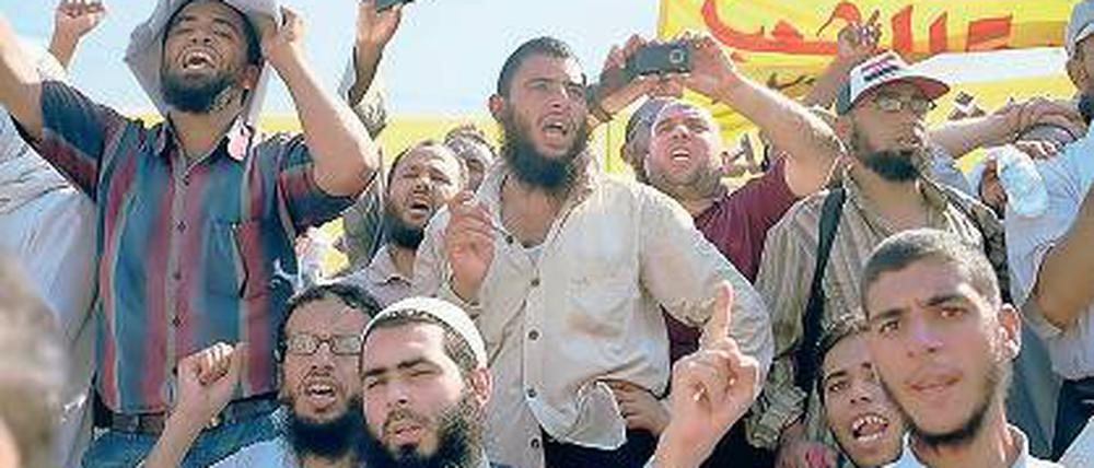 Bilder eines Sommers. Menschen in Aufruhr in Kairo.