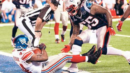 Zum Titel spaziert. New Yorks Ahmad Bradshaw hatte bei seinem entscheidenden Touchdown wenig Gegenwehr.
