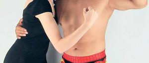 Schrille Masken. Dörthe Weller von „FHP Connect“ und ein mexikanischer Wrestler mit charakteristischem Gesichtsschmuck.