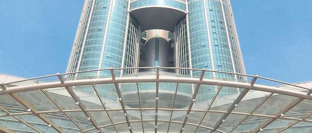 In großem Stil. Der Bauboom in China – hier ein 328 Meter hoher Wolkenkratzer im ostchinesischen Huaxi – kennt derzeit kaum Grenzen. Das hat Folgen.
